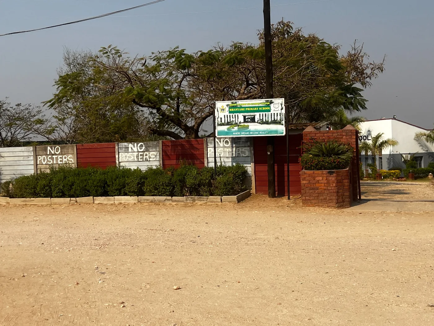 Mhanyame Primary School front gate and entrance sign