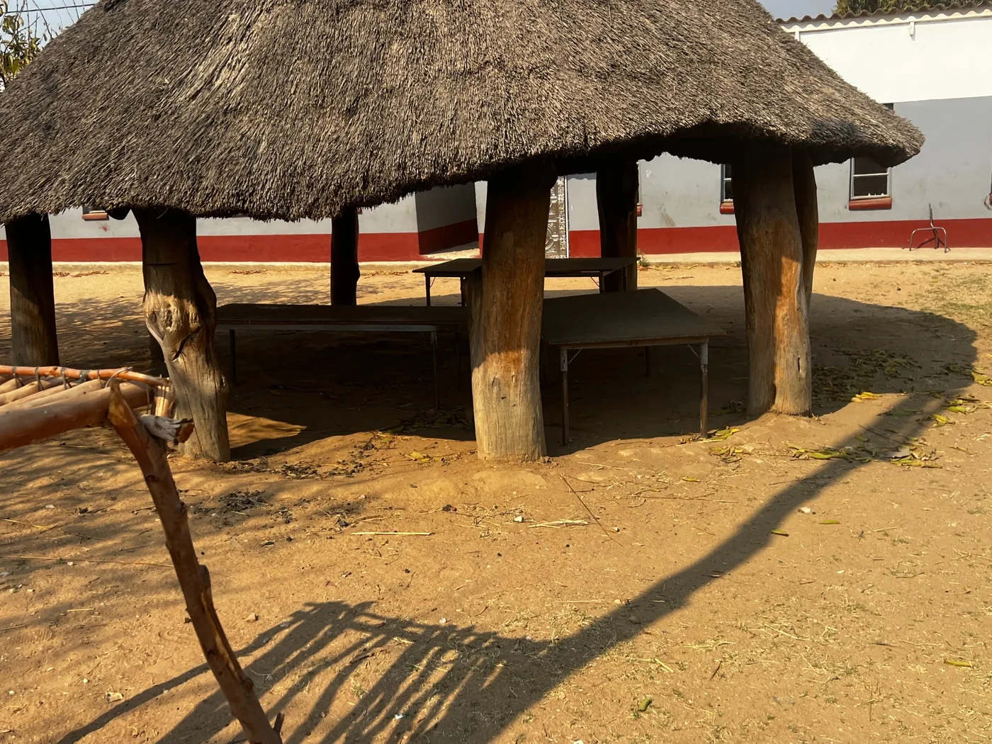 Thatched outdoor shelter in the school grounds